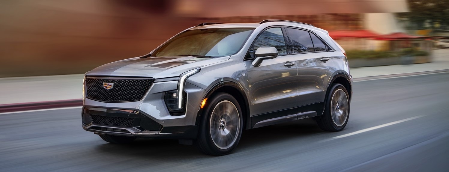 Cadillac XT4 driving through city streets - Cadillac Dealer near San Diego CA
