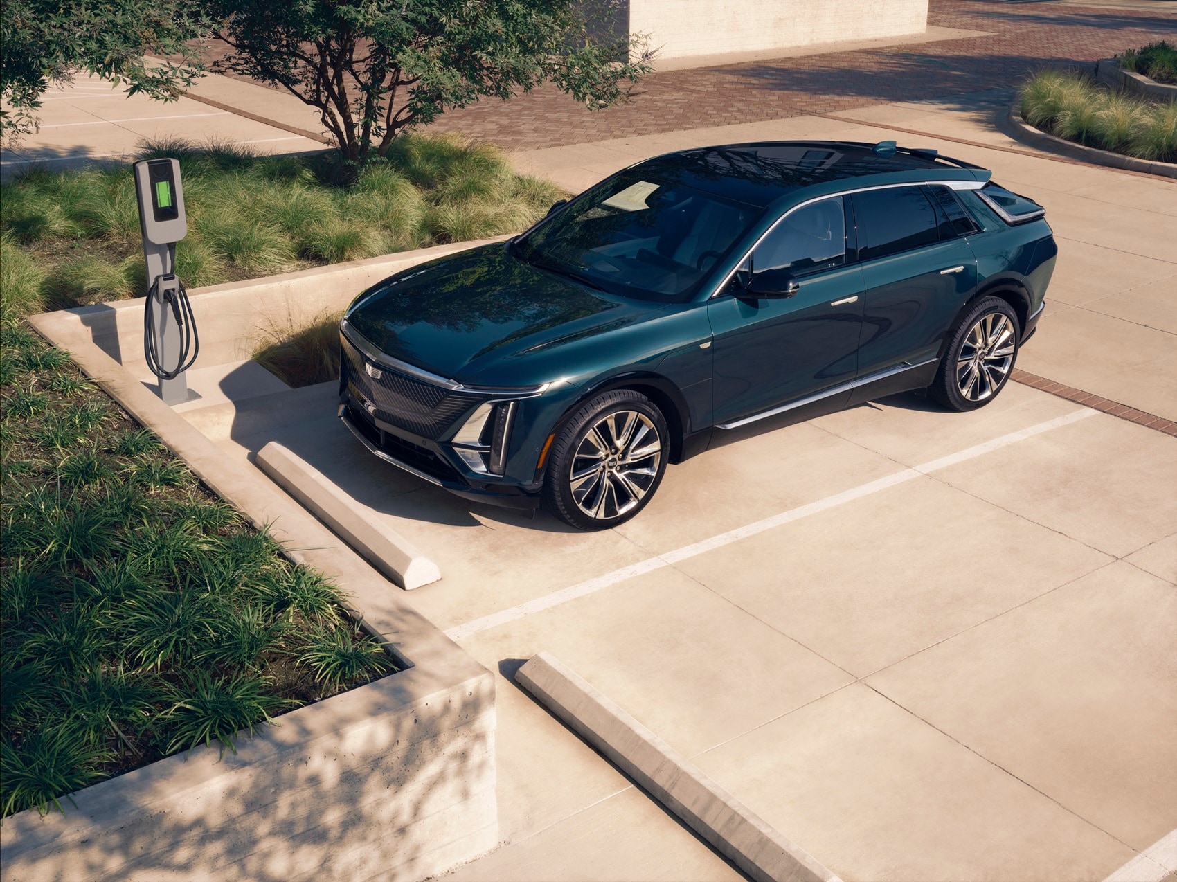 Cadillac Lyriq parked at charging station from Hybrid Car Dealer near Me