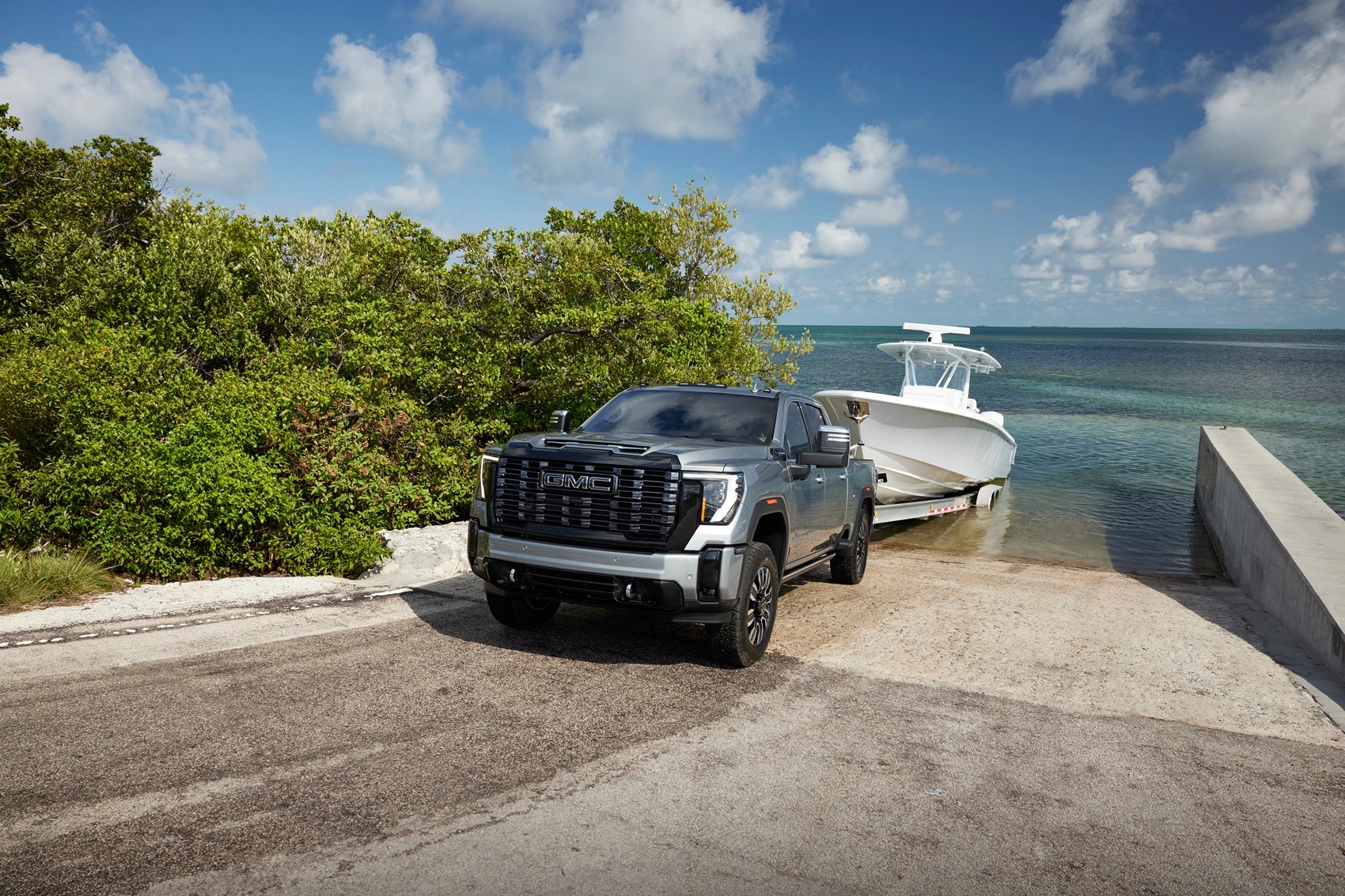 GMC Sierra HD Denali Ultimate hitching a boat out of the water