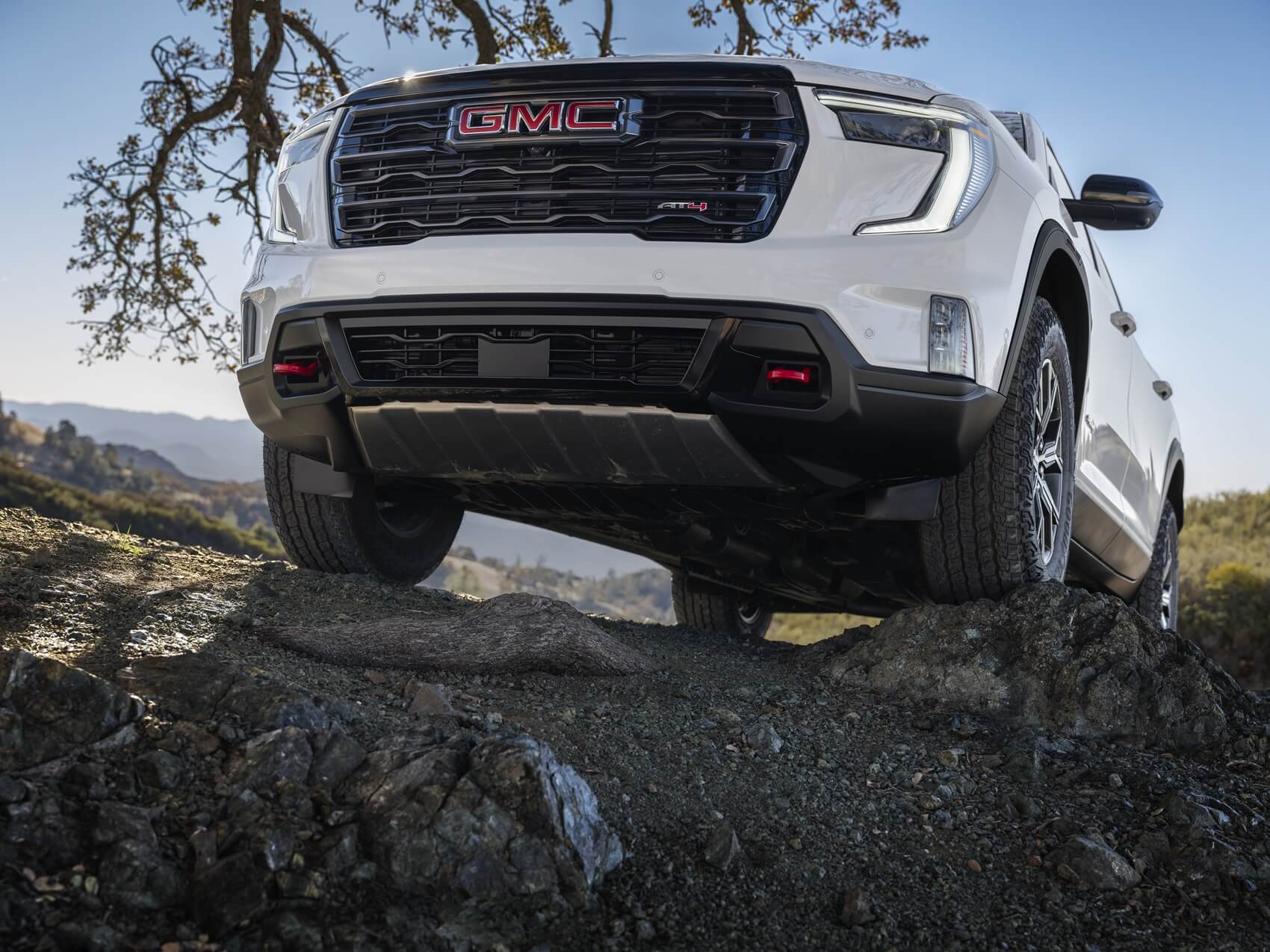 Used GMC SUV parked on the cliff's edge