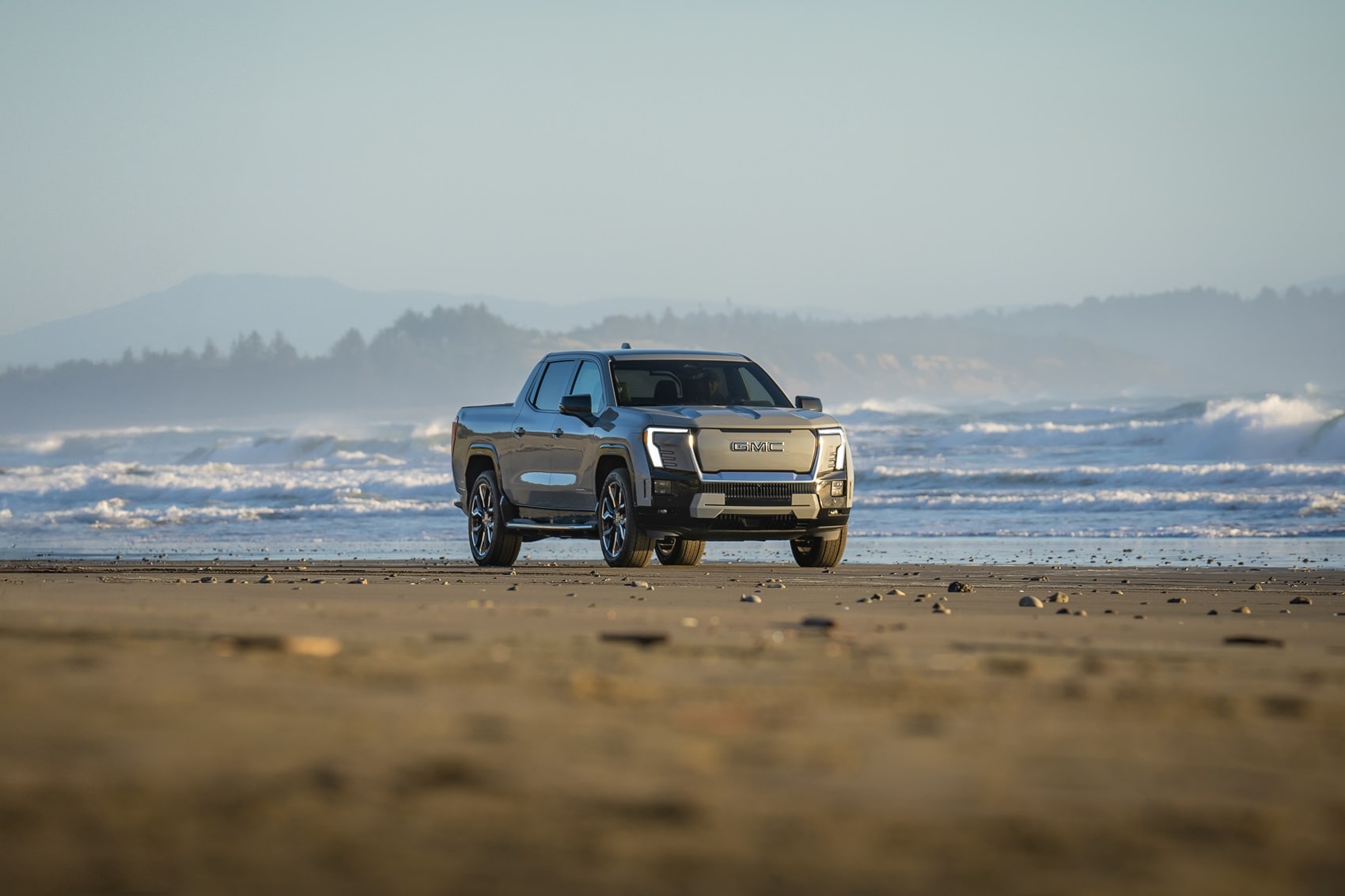 GMC Sierra EV Denali parked on the beach