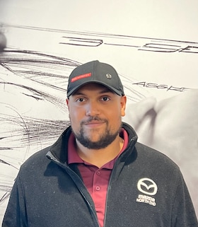 Staff member Alex Maillet from ID_156d312bb0b4