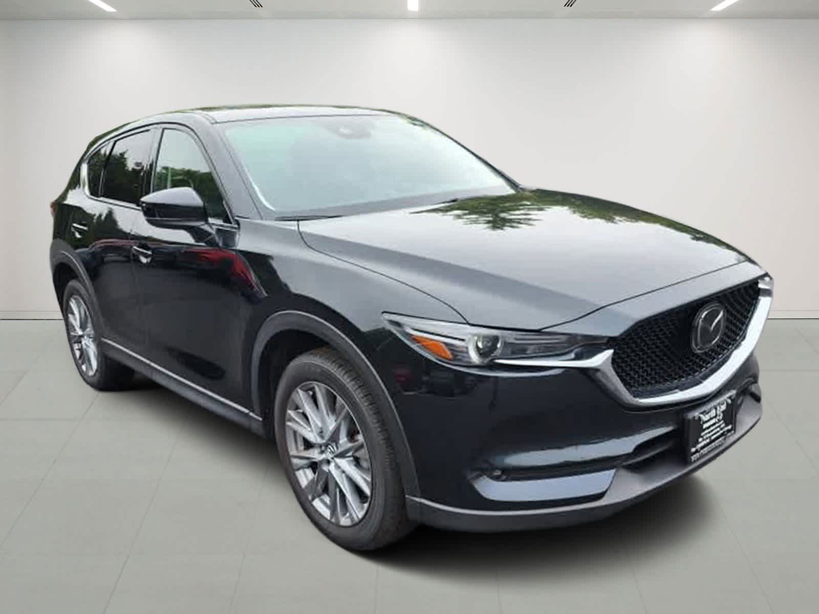 Used 2021 Mazda CX-5 Grand Touring with VIN JM3KFBDMXM0466595 for sale in Lunenburg, MA