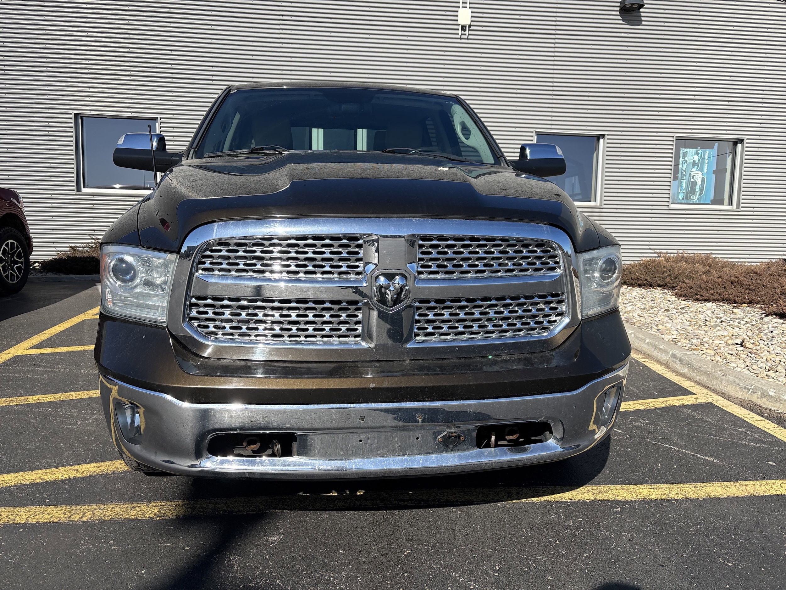 Used 2014 RAM Ram 1500 Pickup Laramie with VIN 1C6RR7NM1ES355800 for sale in Escanaba, MI