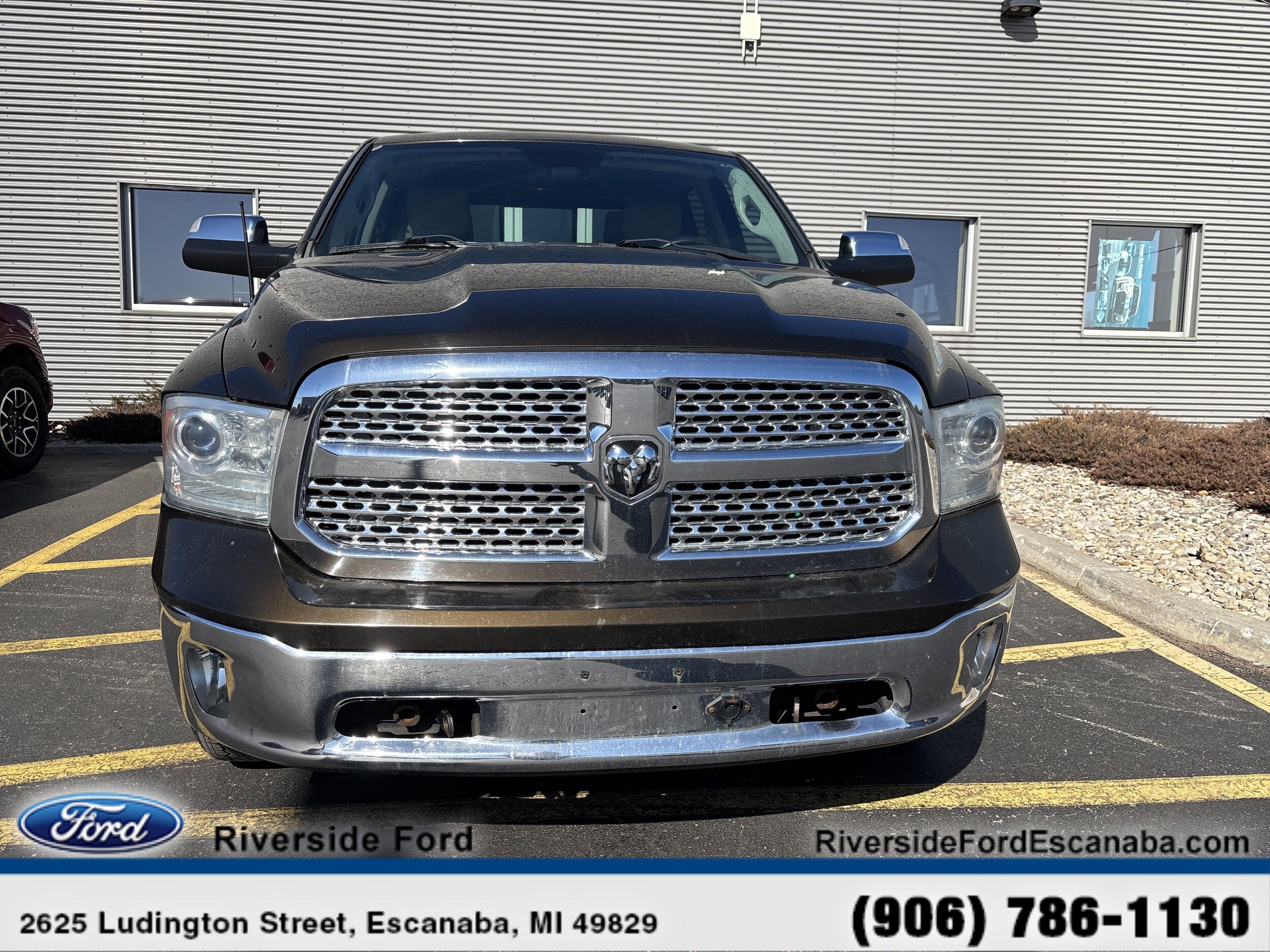 Used 2014 RAM Ram 1500 Pickup Laramie with VIN 1C6RR7NM1ES355800 for sale in Escanaba, MI