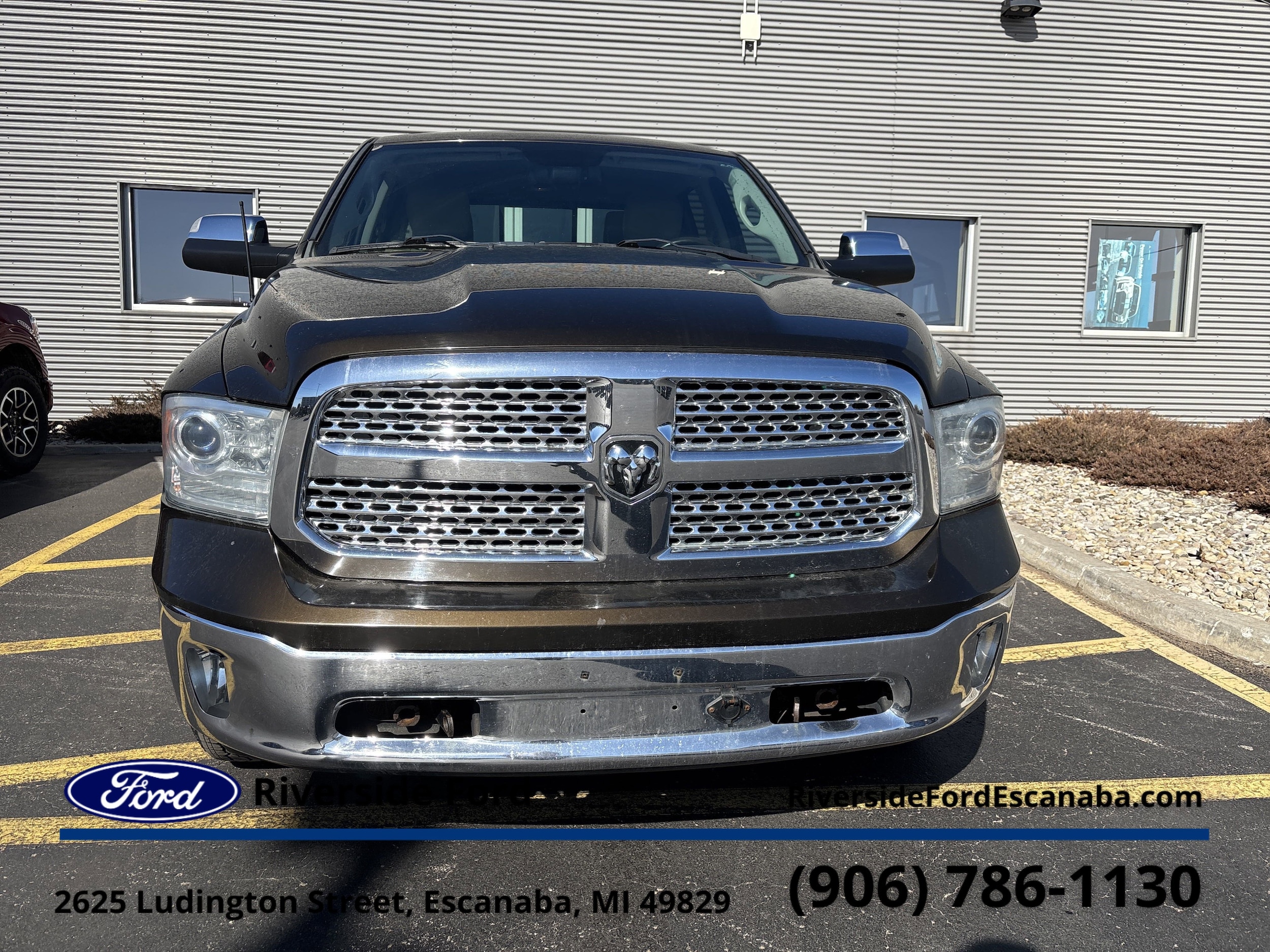 Used 2014 RAM Ram 1500 Pickup Laramie with VIN 1C6RR7NM1ES355800 for sale in Escanaba, MI