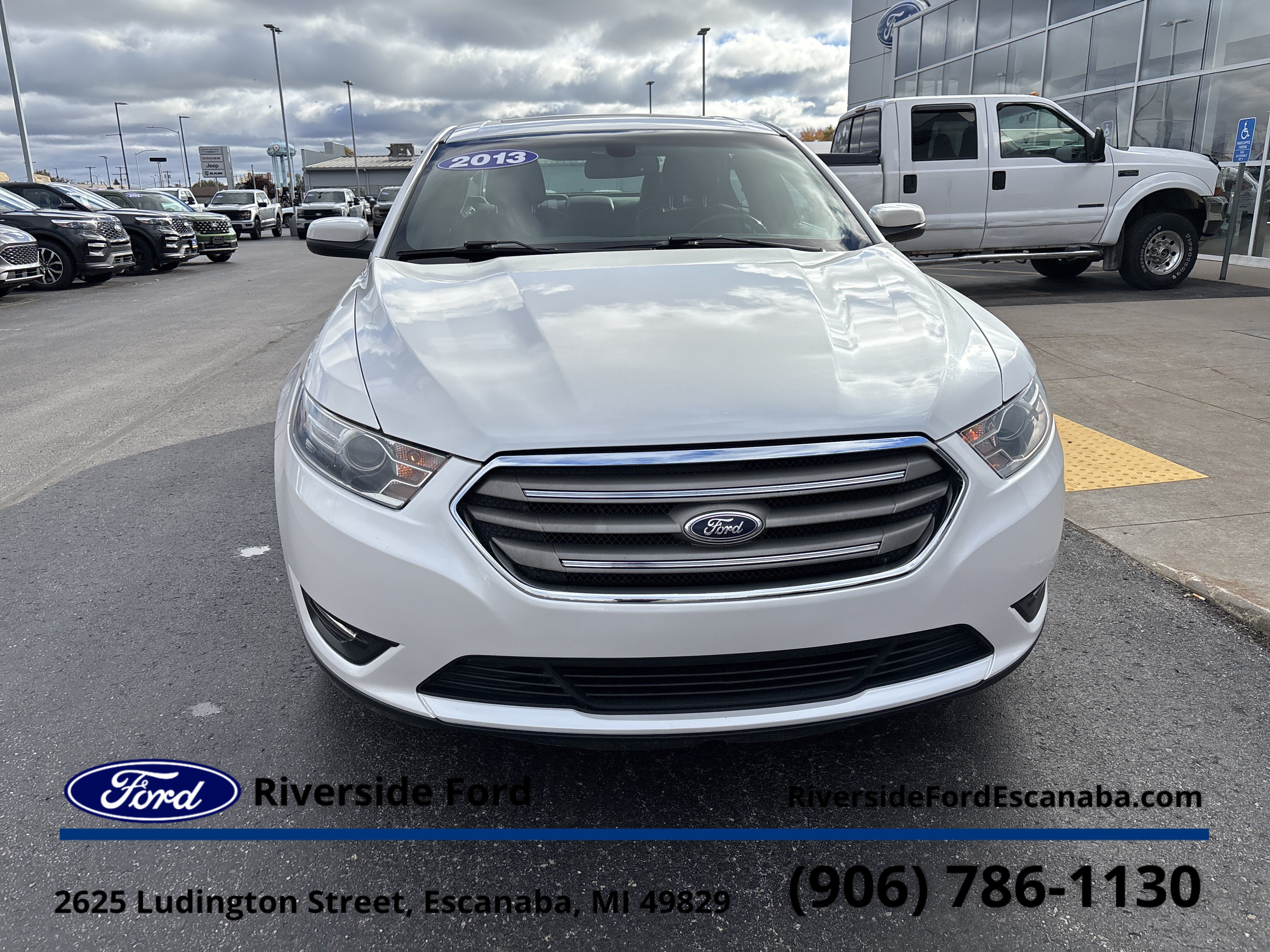 Used 2013 Ford Taurus SEL with VIN 1FAHP2E83DG180523 for sale in Escanaba, MI