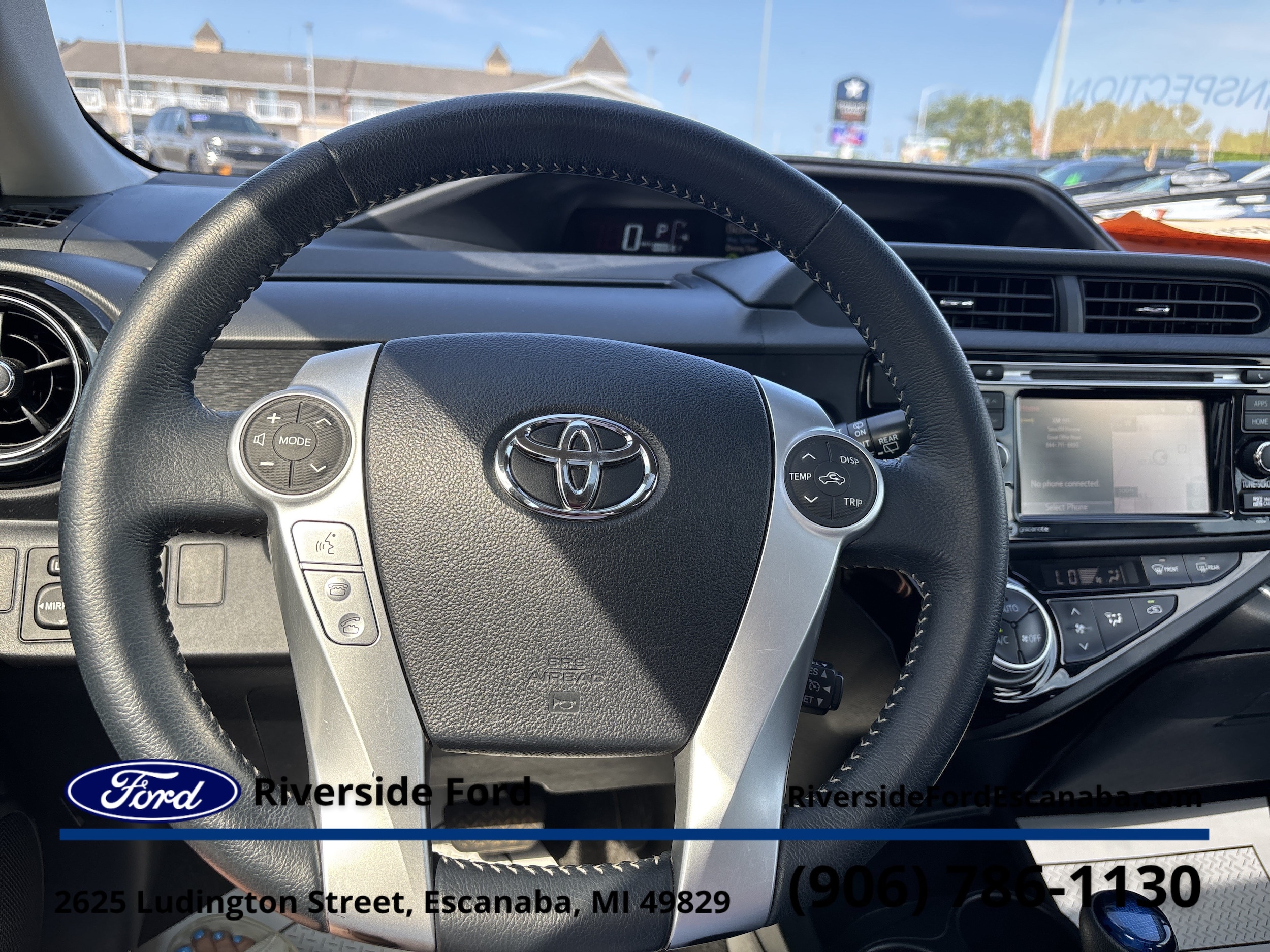 Used 2015 Toyota Prius c One with VIN JTDKDTB30F1103864 for sale in Marquette, MI