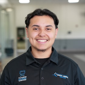 Staff member Edwin Hernandez from 214d7d969279