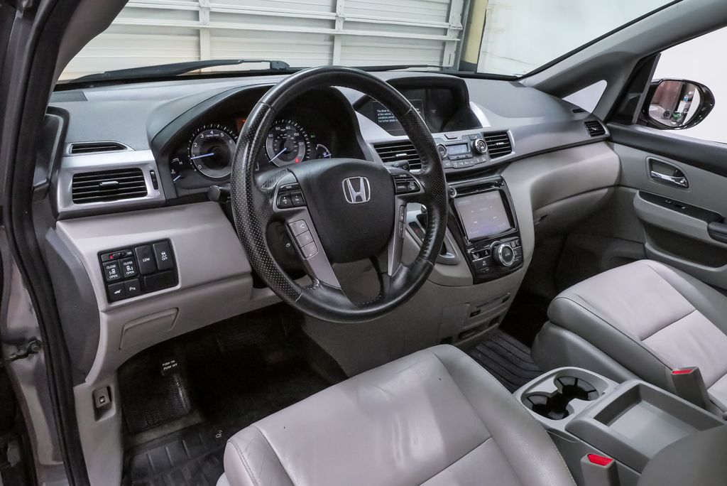 Used 2015 Honda Odyssey Touring with VIN 5FNRL5H96FB049471 for sale in Spring, TX