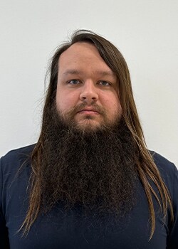 Staff member Elliott Denmon from ID_c9becdd9dadc