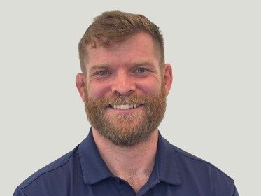 Staff member Brett Nicholas from ID_fa0ffd078c22