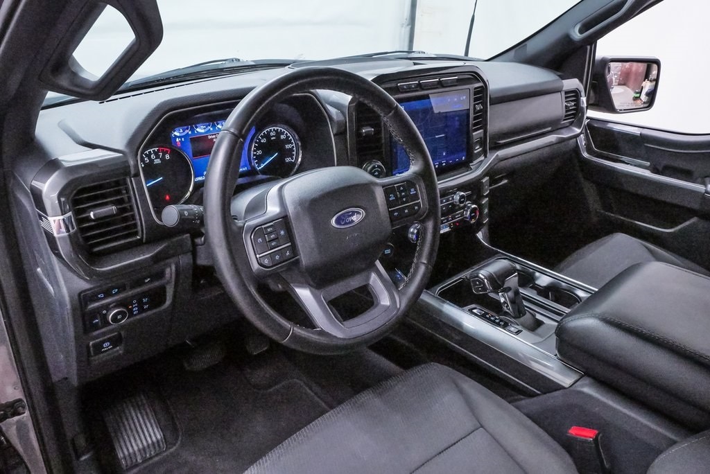 Used 2023 Ford F-150 XLT with VIN 1FTEW1C55PFC57020 for sale in Spring, TX