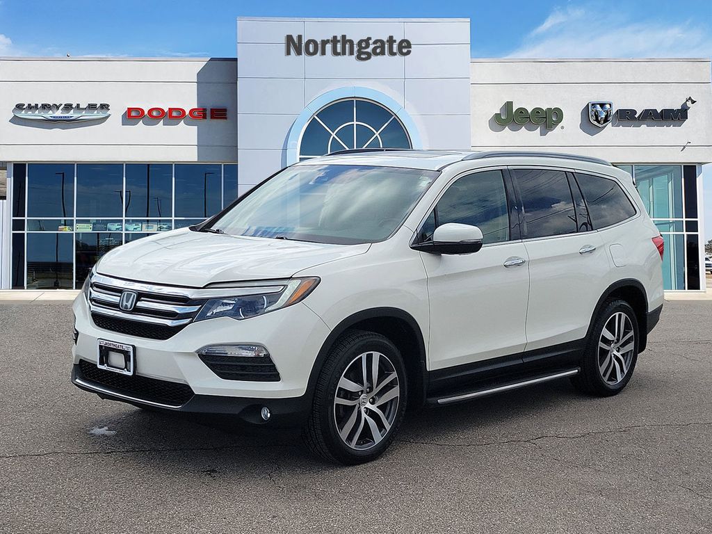 Used 2017 Honda Pilot Touring with VIN 5FNYF6H99HB068883 for sale in Groesbeck, OH