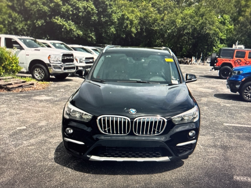 Used 2018 BMW X1 28i with VIN WBXHU7C31J5L06296 for sale in Lake Park, FL