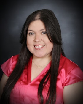 Staff member Lorina Valdez from 8fa39ff9f024