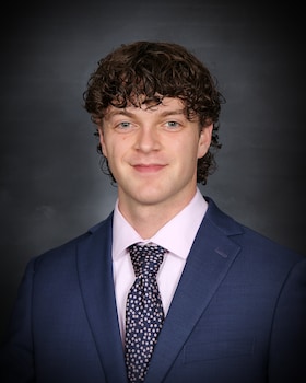 Staff member Harrison Powell from 8fa39ff9f024