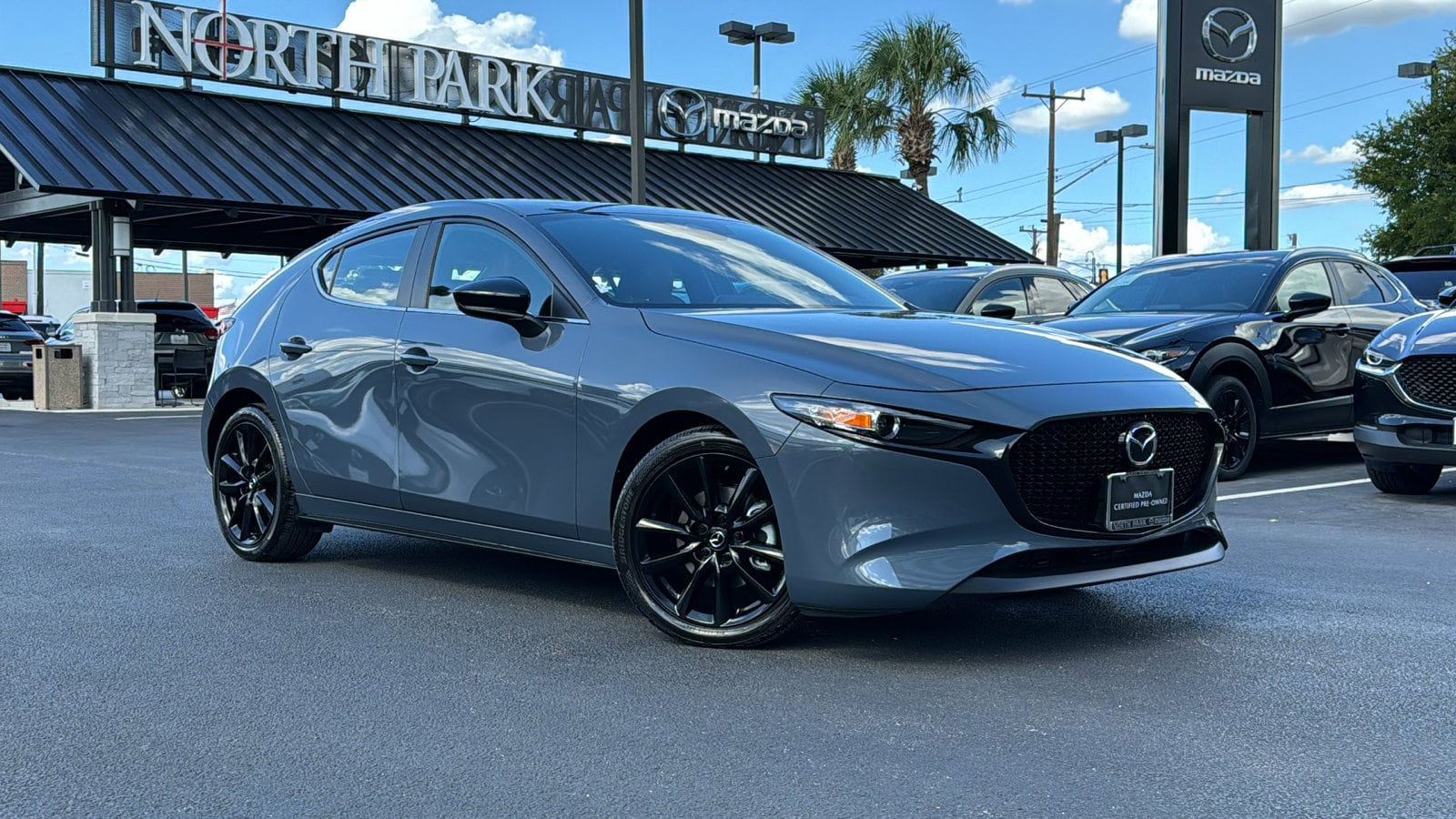 Certified 2024 Mazda Mazda3 Carbon Edition with VIN JM1BPBLM8R1707675 for sale in San Antonio, TX