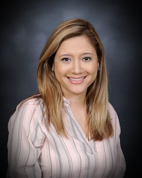 Staff member Nina Sanchez from 8fa39ff9f024