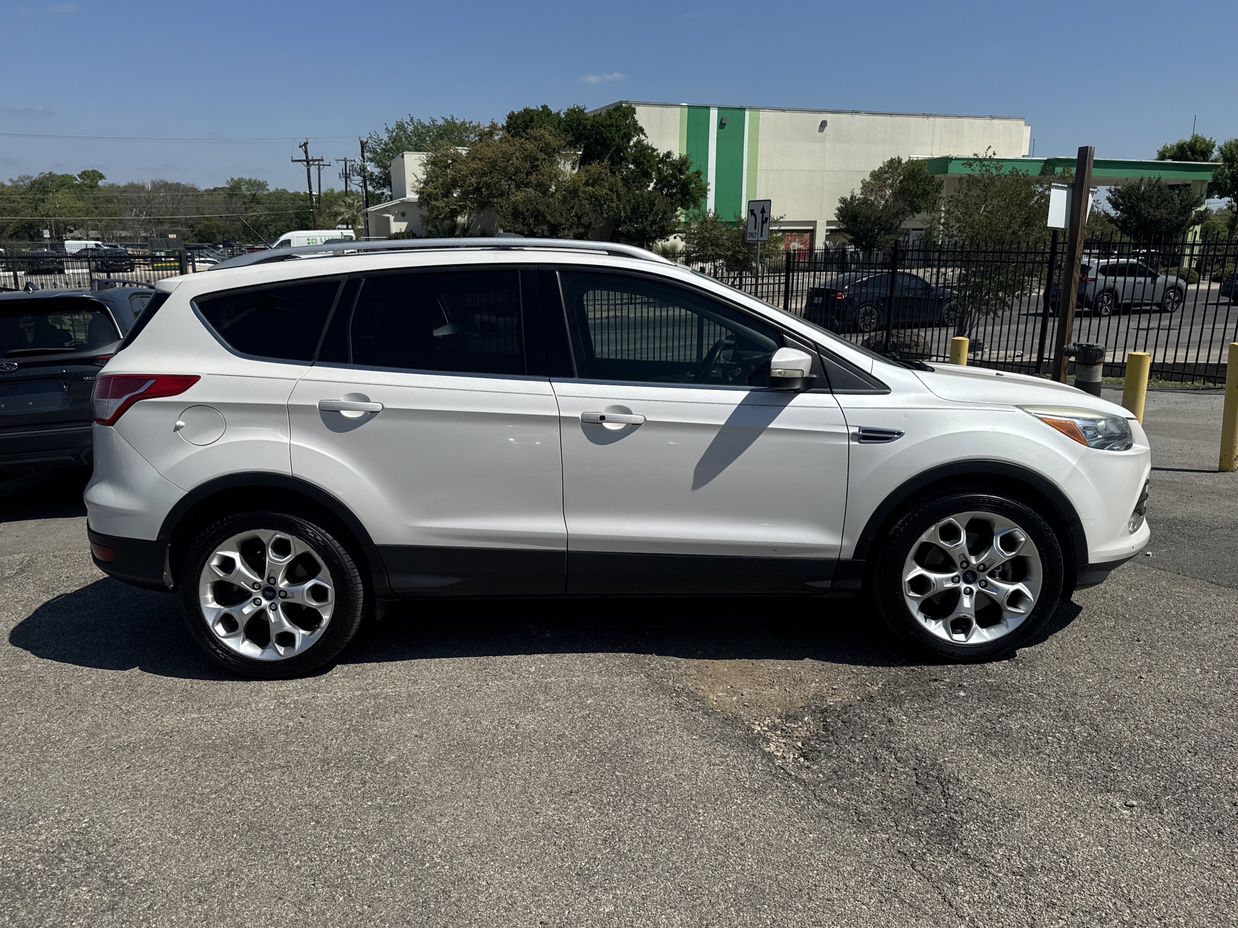 Used 2014 Ford Escape Titanium with VIN 1FMCU0J96EUB79557 for sale in San Antonio, TX