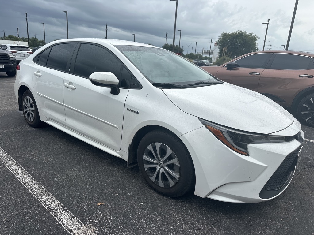 Used 2021 Toyota Corolla LE with VIN JTDEAMDE7MJ034825 for sale in Northfield, Minnesota
