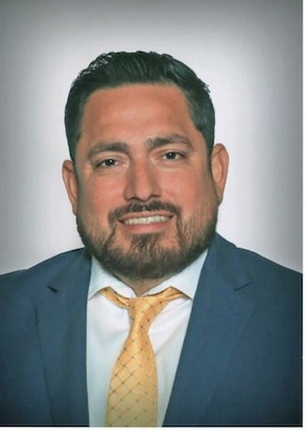 Staff member John Flores from ID_488348461310