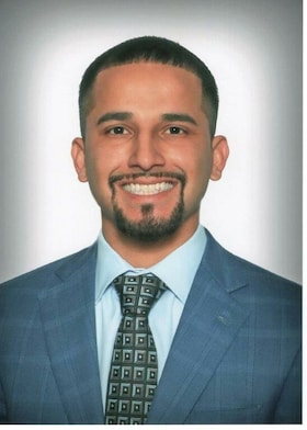 Staff member John Reyes from ID_bff655b98101