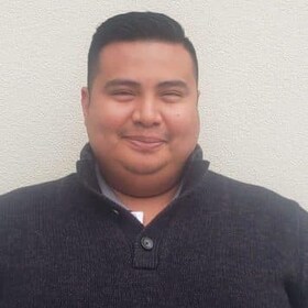Staff member Esac Martinez from ID_c6e748f77a62