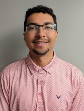 Staff member Dominic Grubbs from 85059084beee