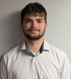 Staff member Garret Schruers from 4ad6c4fbe4aa