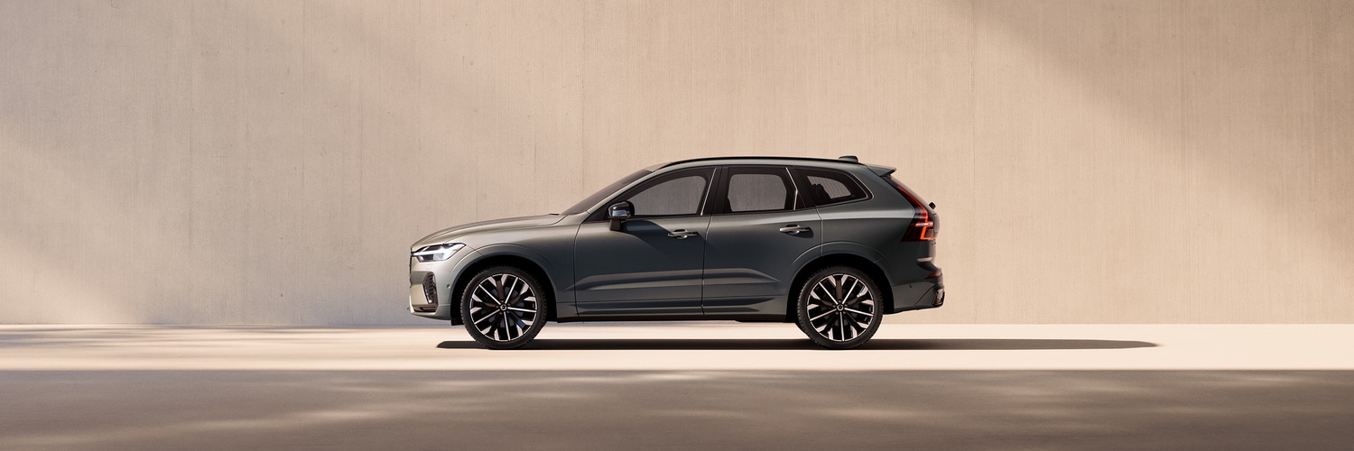 New 2026 Volvo XC60 driving into sunlight