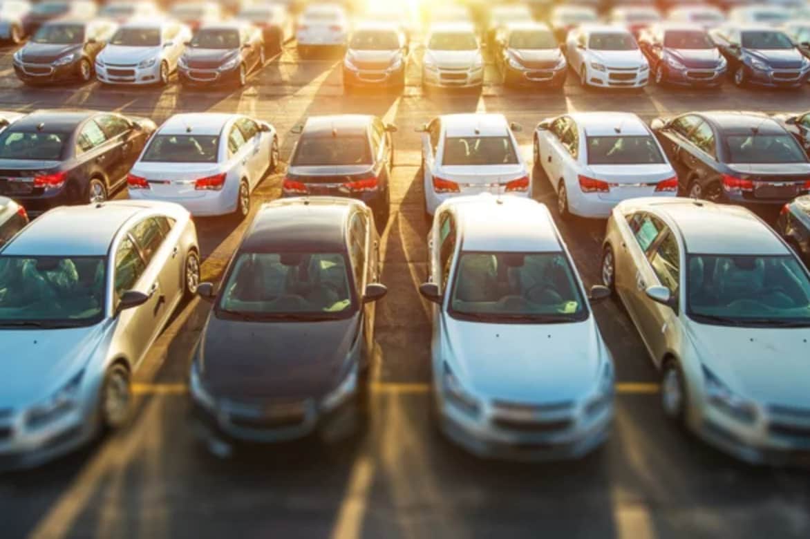 Used car lot rows of cars.png