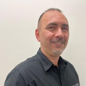 Staff member Yuksel Jusuf from ID_2f6138