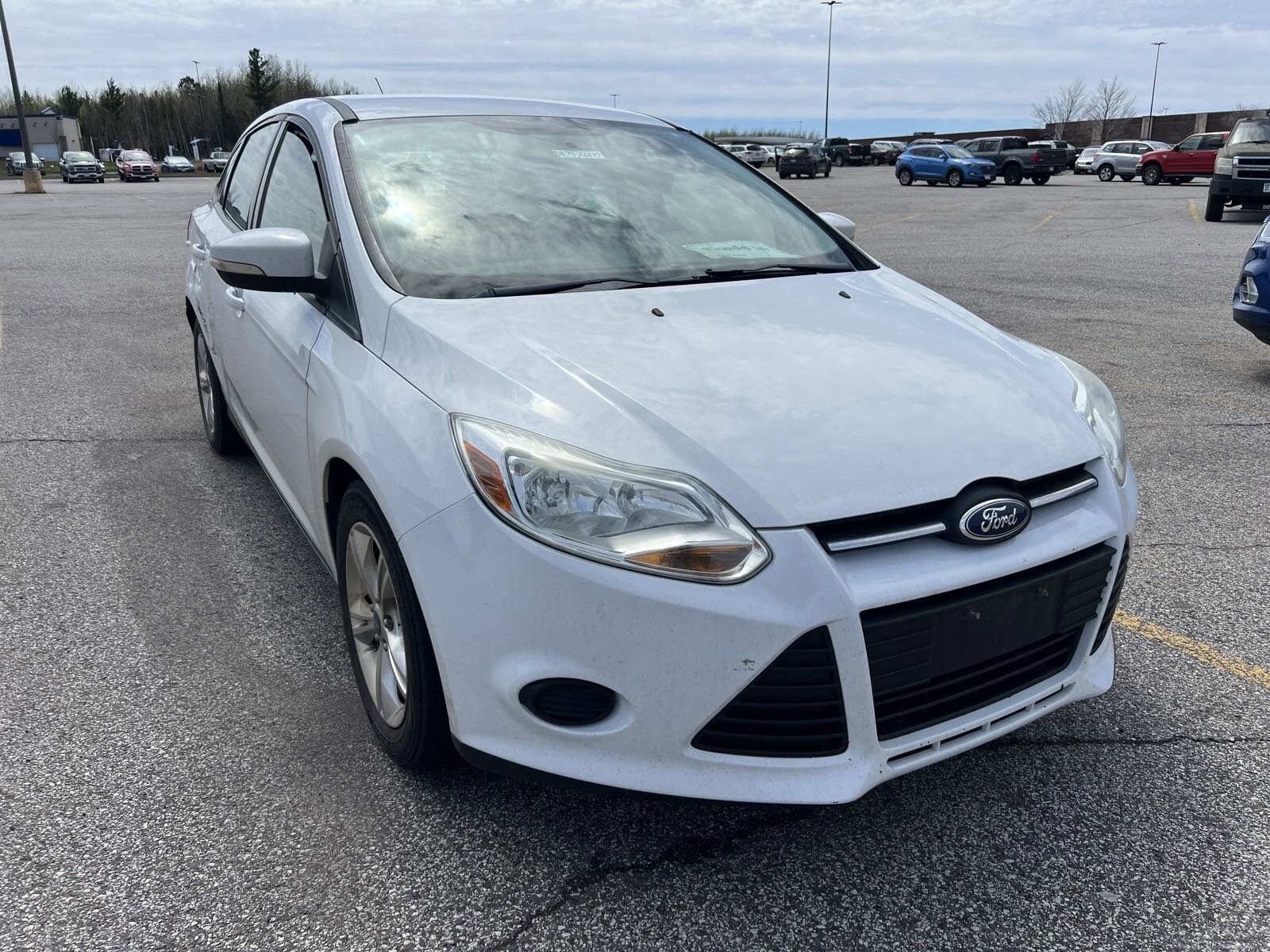 Used 2013 Ford Focus SE with VIN 1FADP3F28DL354012 for sale in Duluth, Minnesota