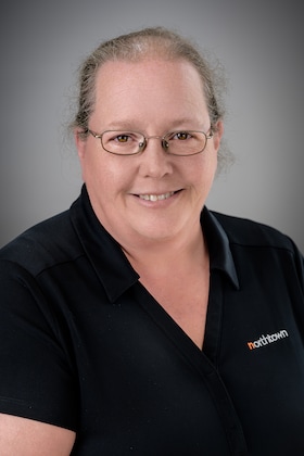 Staff member Amy Ostrowski from ID_a7e12b9058ac