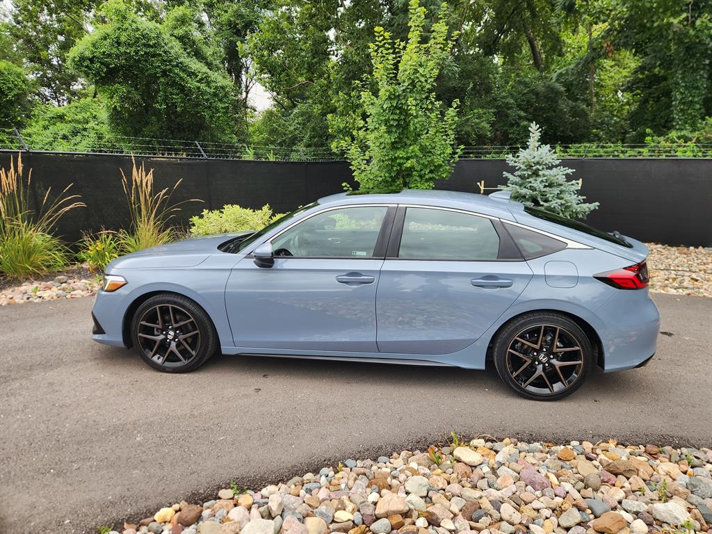 Used 2023 Honda Civic Hatchback Sport Touring with VIN 19XFL1H89PE008889 for sale in Kansas City