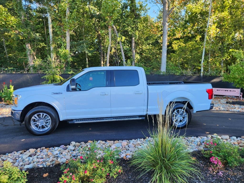 Used 2020 Ford F-150 Lariat with VIN 1FTFW1E5XLKF04597 for sale in Kansas City, MO