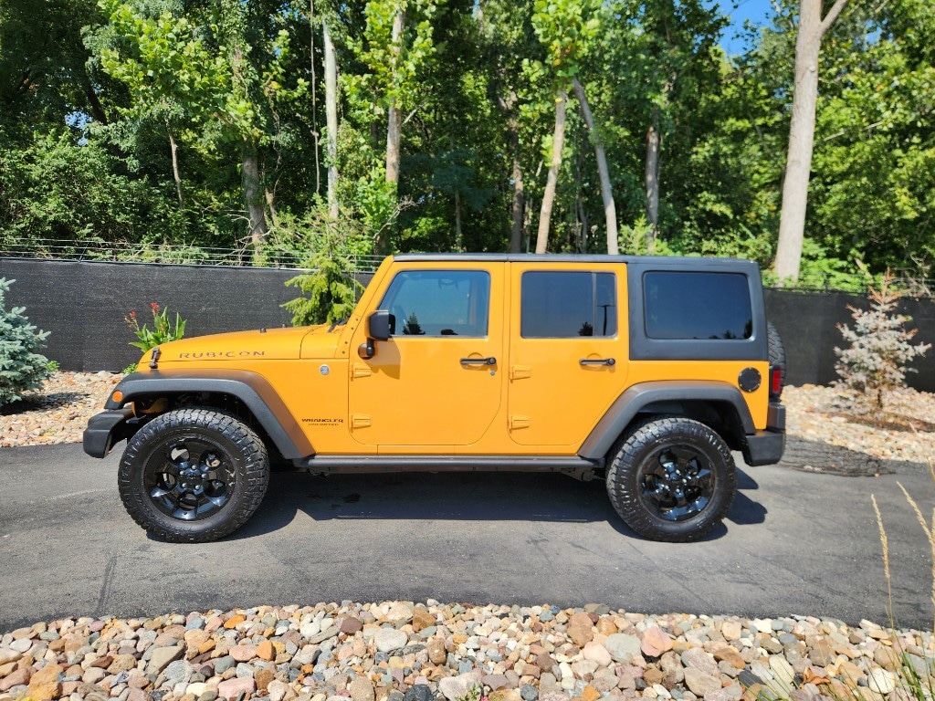 Used 2012 Jeep Wrangler Unlimited Rubicon with VIN 1C4BJWFG1CL177026 for sale in Kansas City