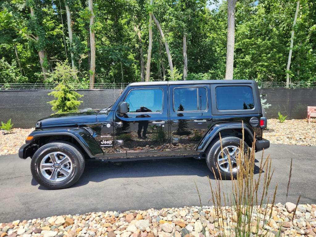 Used 2023 Jeep Wrangler 4-Door Sahara with VIN 1C4HJXEN3PW595530 for sale in Kansas City