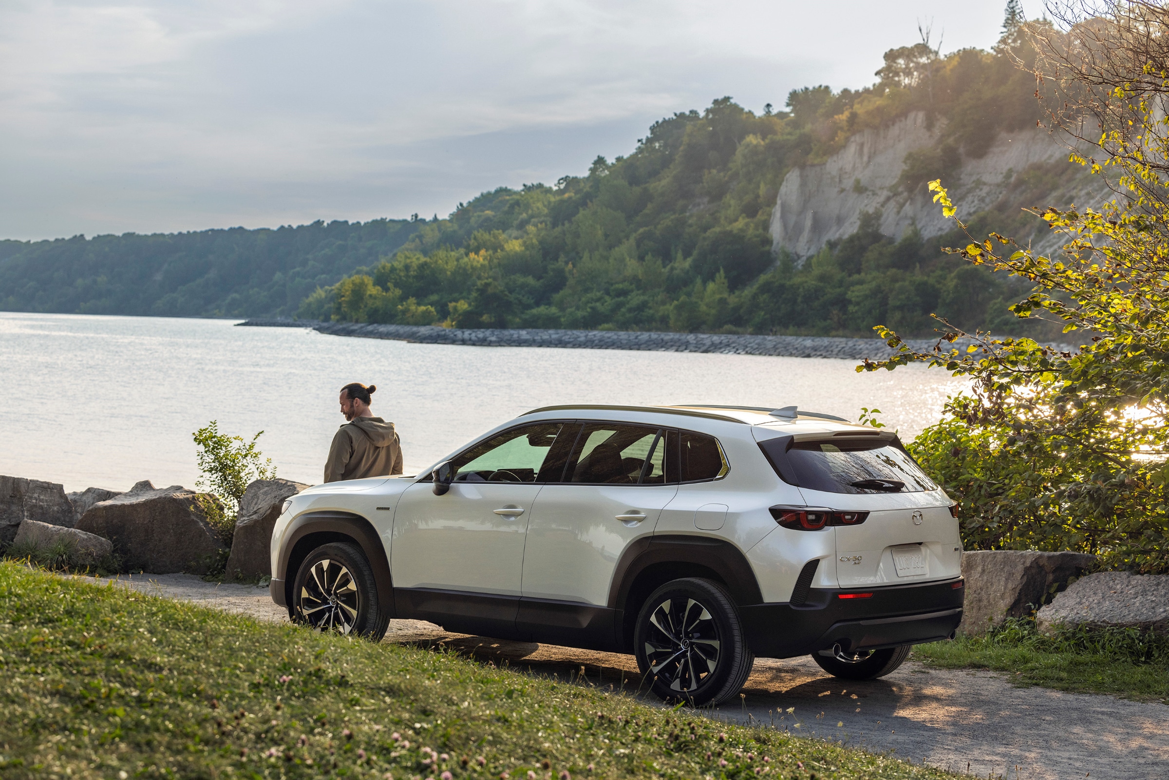 The 2026 Mazda CX-50 parked by a lake