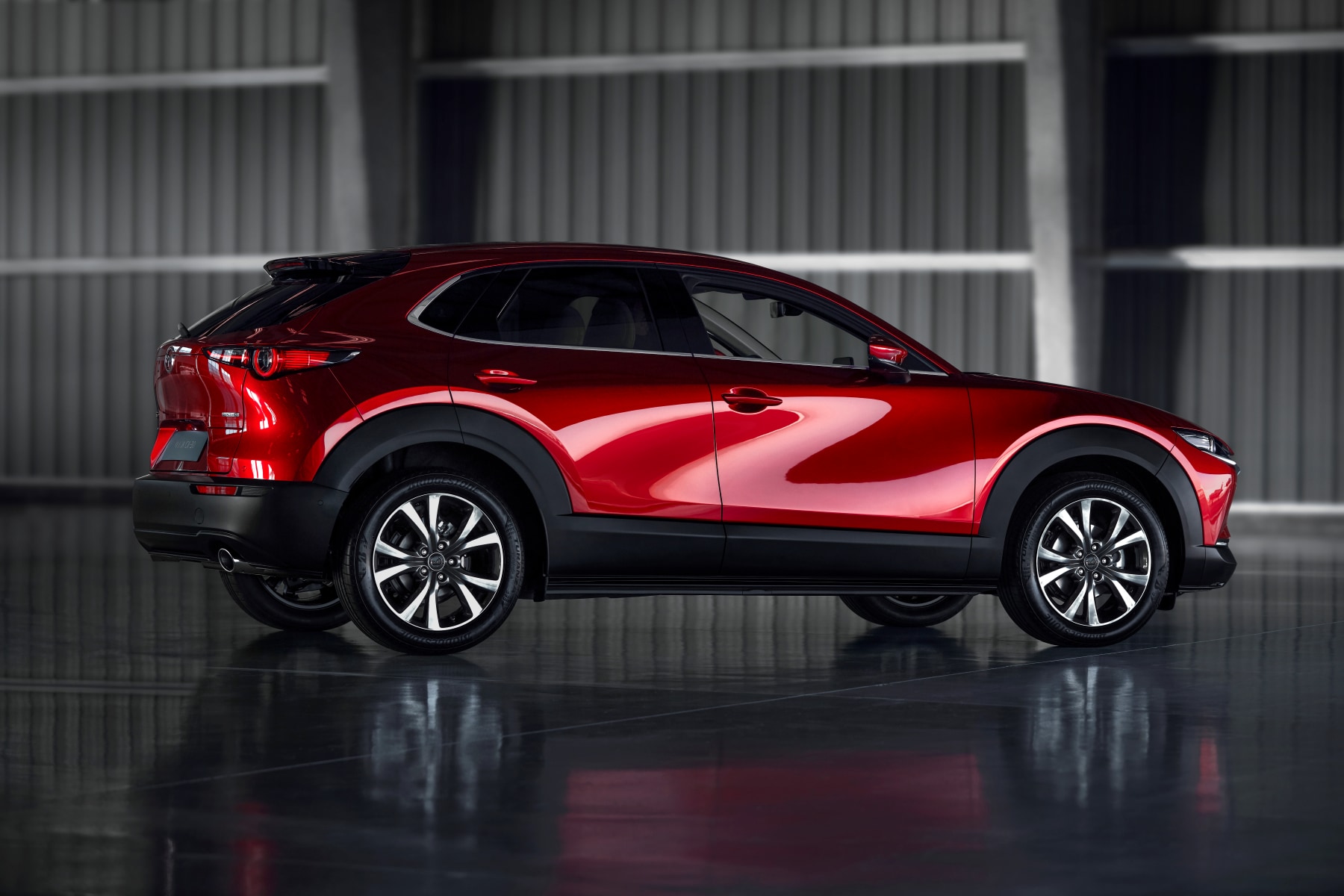 Profile of a parked Mazda crossover