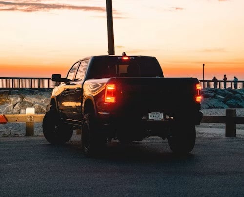 Lifted Truck Sunset Background - Rear