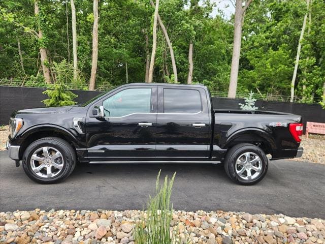 Used 2021 Ford F-150 Lariat with VIN 1FTFW1ED4MFA57623 for sale in Kansas City