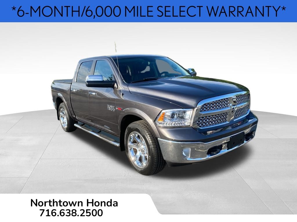 Used 2014 RAM Ram 1500 Pickup Laramie with VIN 1C6RR7NM1ES371012 for sale in Amherst, NY