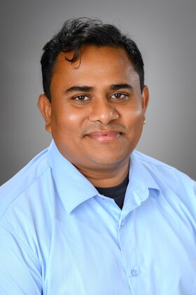 Staff member Chandra Lagun from ID_a6e0a5f8e4f3