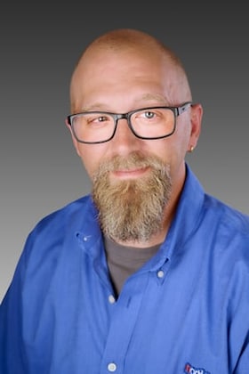 Staff member Kristopher Warren from ID_d92623e38617