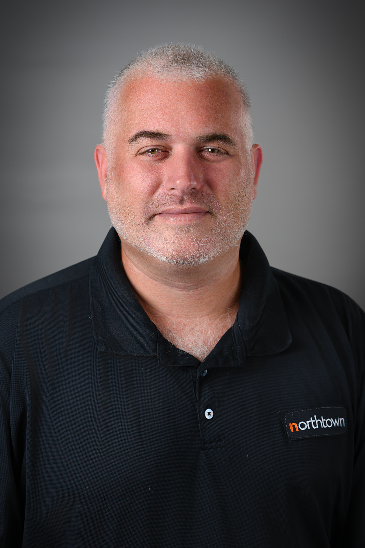 Staff member Chris Dent from ID_d92623e38617