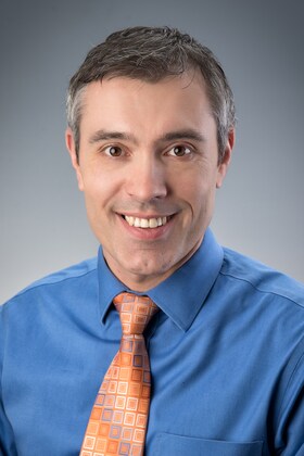 Staff member Alex Tkalich from ID_0e1509