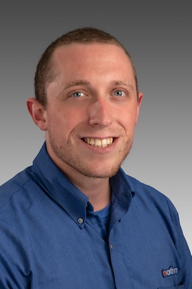 Staff member Gabe Neumann from 449373e3c2a1