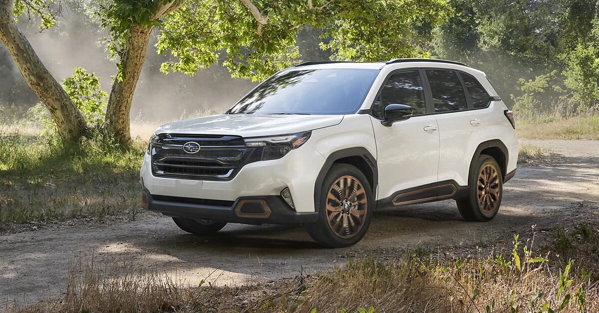 A white 2026 Subaru Forester parked on dirt road